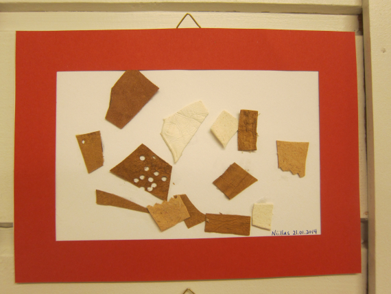 Bilde laget av biter av skinn.