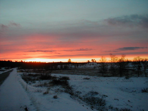 Bilde av sola som går ned.